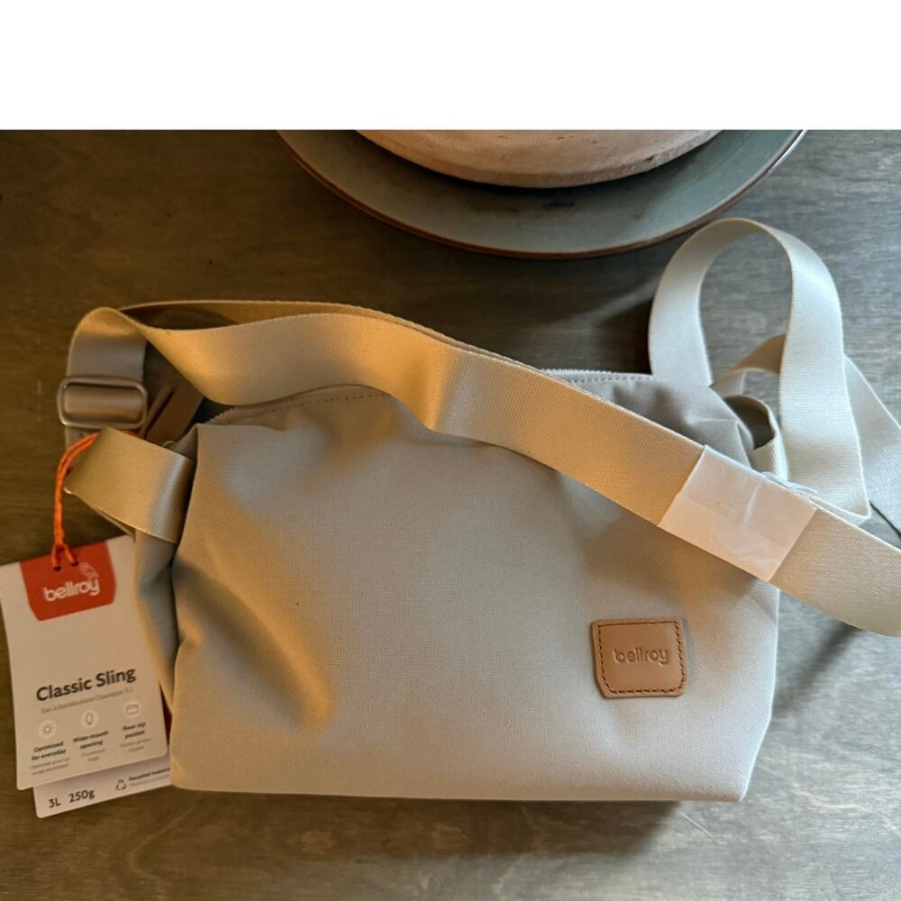 Brand new with tags bellroy sling. Shade tahini.